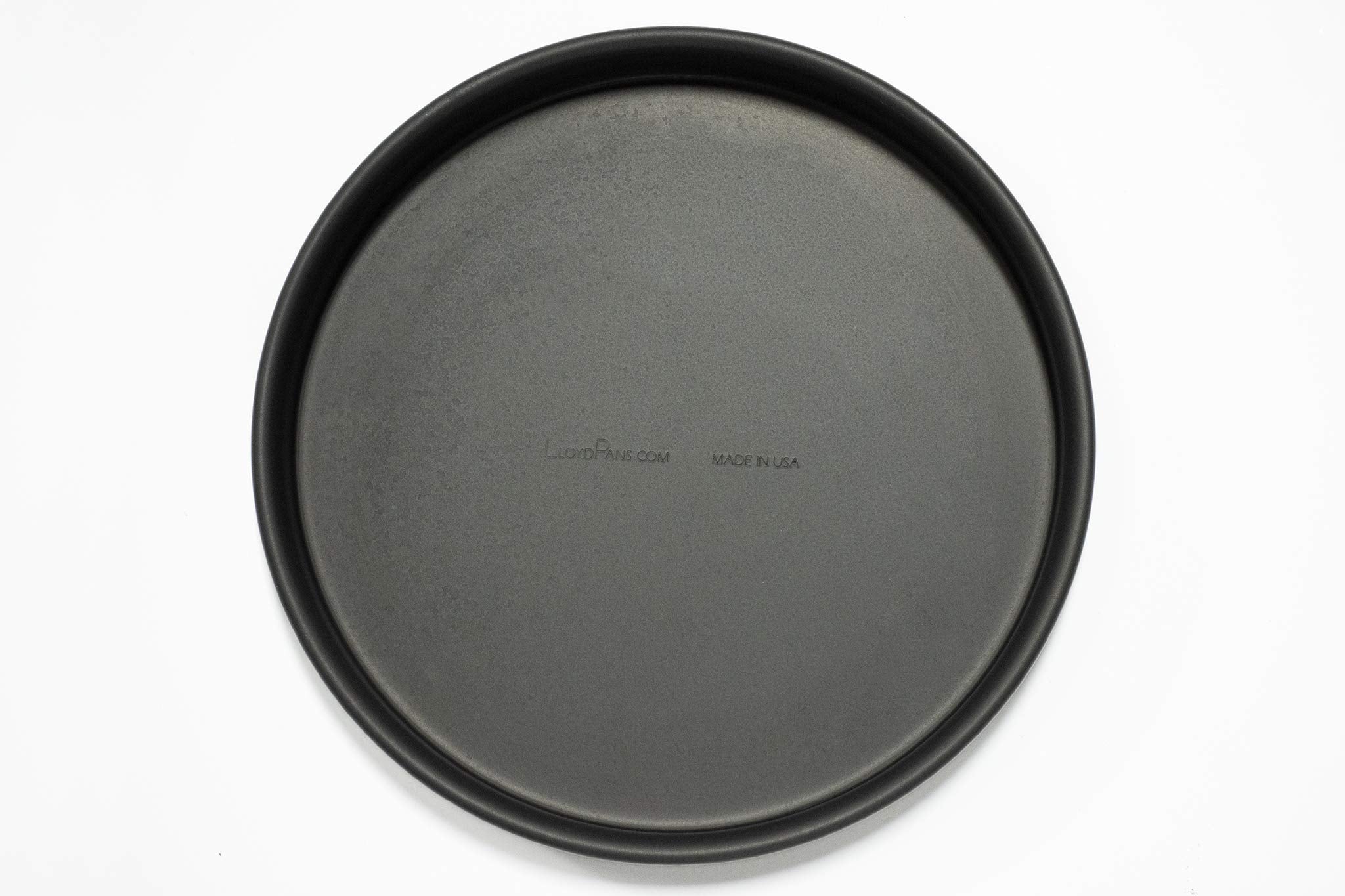 Lloyd Pans pan in oven baking pizza for even browning benefit