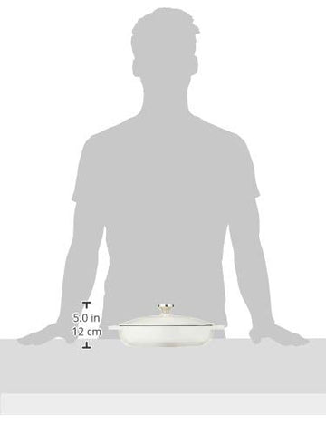 Lodge braiser dual assist handles showing secure grip for stovetop-to-oven transfer