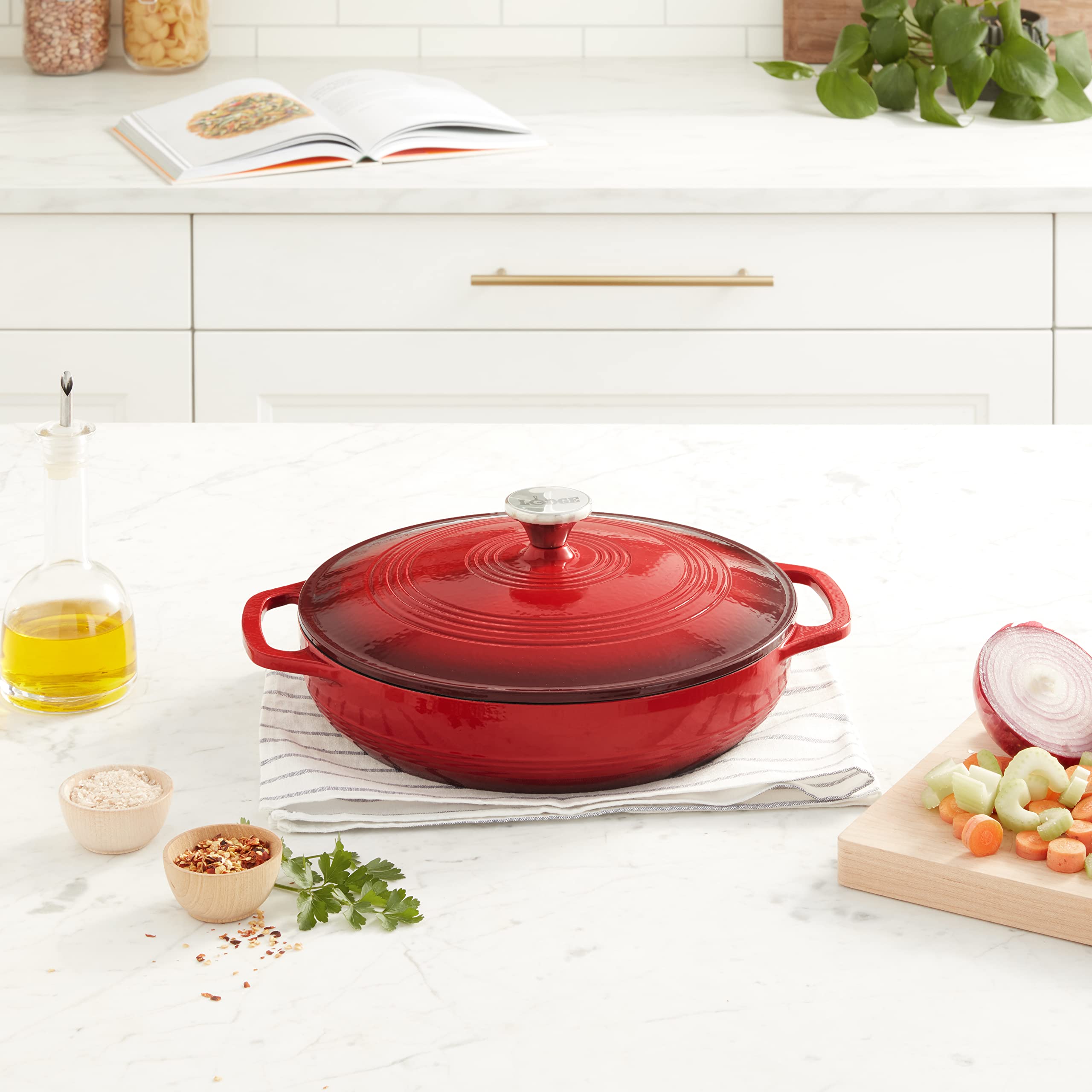 Lodge braiser lid closeup showing moisture‑locking design for juicier results