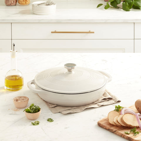 Lodge braiser lid closeup highlighting moisture‑locking seal and flavor retention