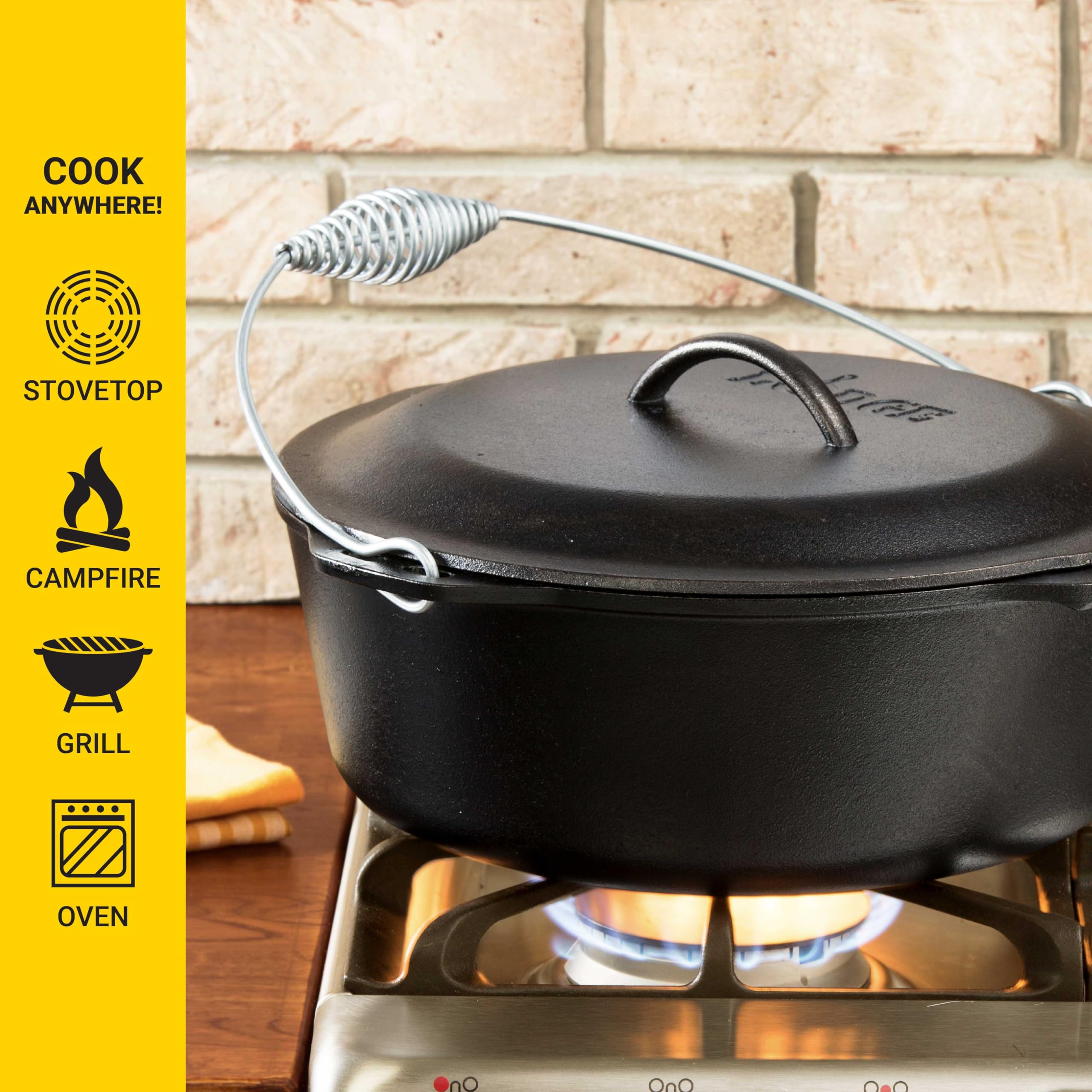 Lodge dutch oven bail handle detail showing secure grip for lifting over coals