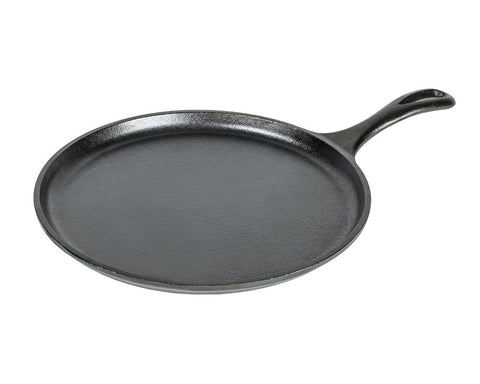 Lodge griddle cooking pancakes showcasing even heat and consistent browning benefit
