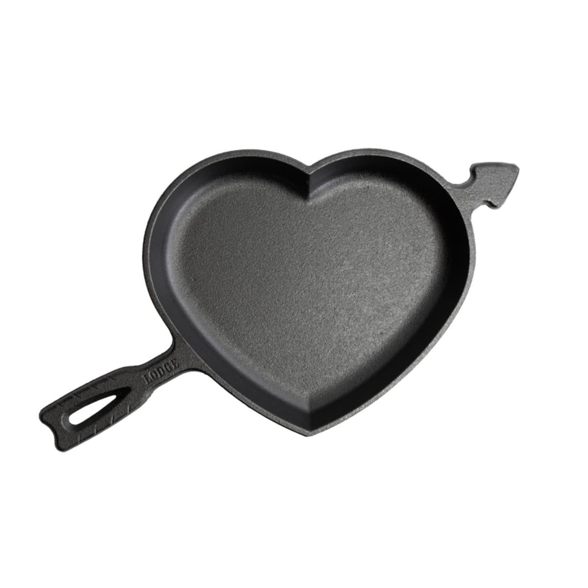 Lodge heart skillet front view showing collectible heart-and-arrow design and cast-iron durability