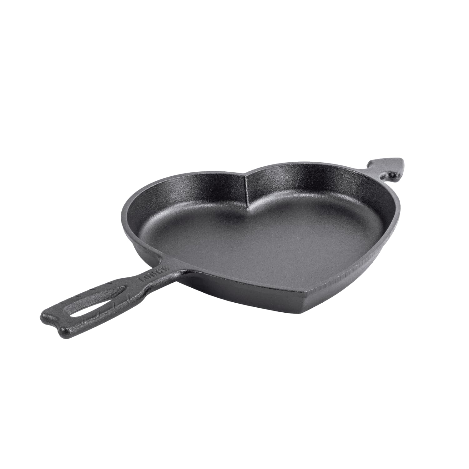 Lodge heart skillet on stovetop demonstrating even heating and searing performance