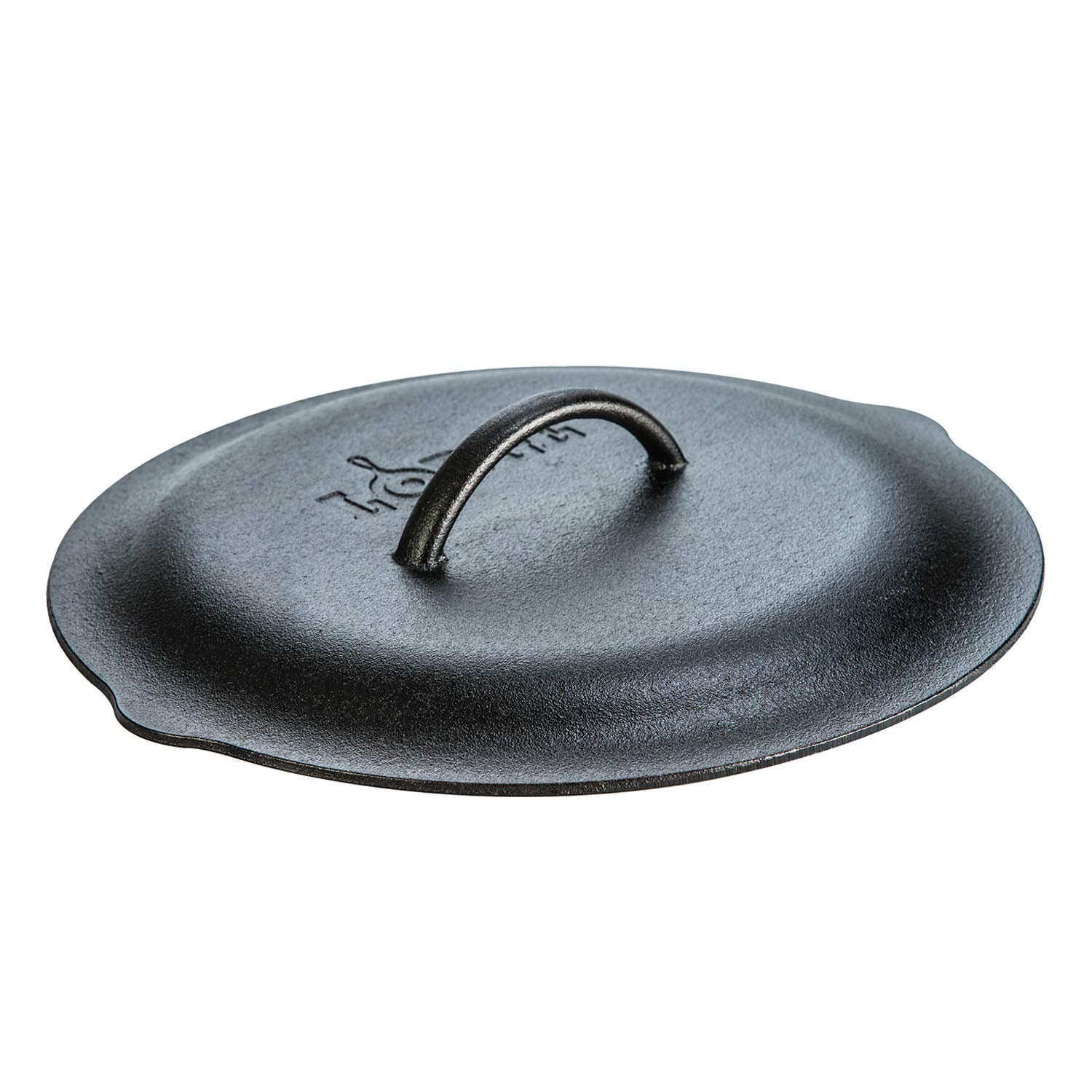 Lodge lid beside ruler for 12-inch scale to show fit and compatibility benefit