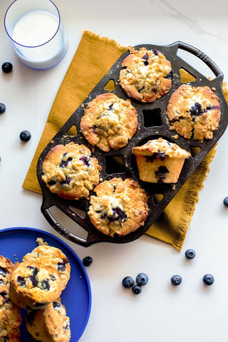 Lodge muffin pan holding freshly baked muffins on a table showing presentation benefit
