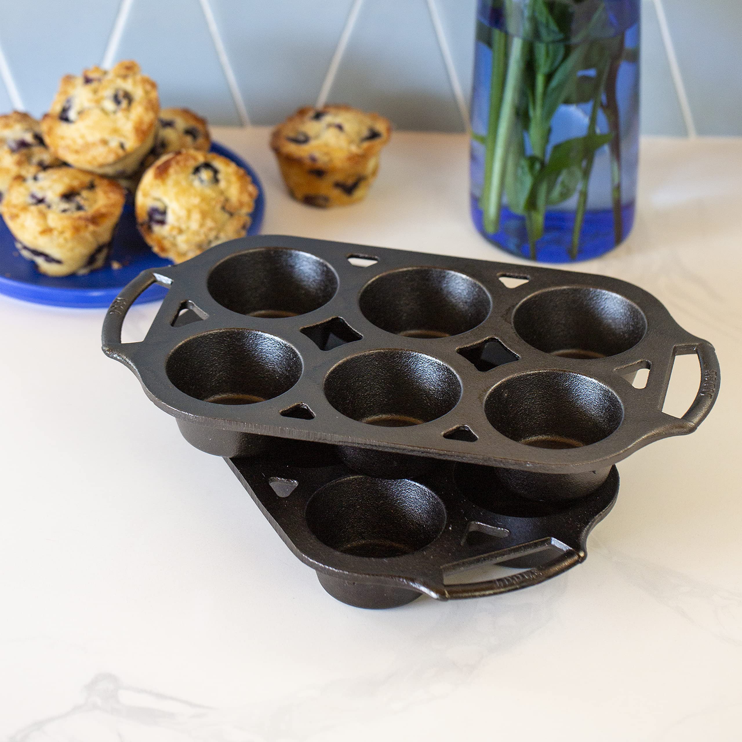 Lodge muffin pan close-up of six wells showing even wells and nonstick benefit