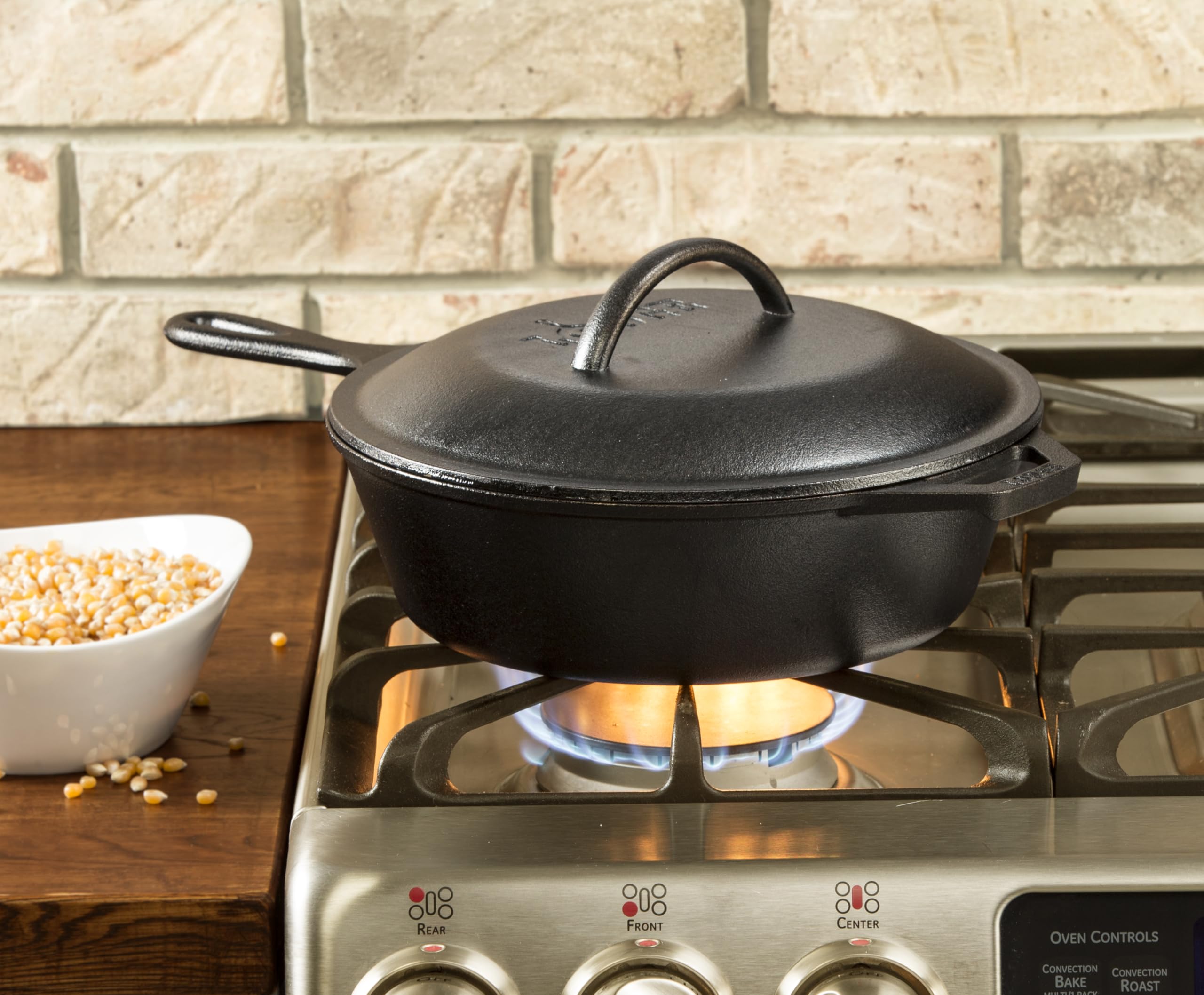 Lodge skillet lid close-up highlighting tight fit and even-heat retention benefit