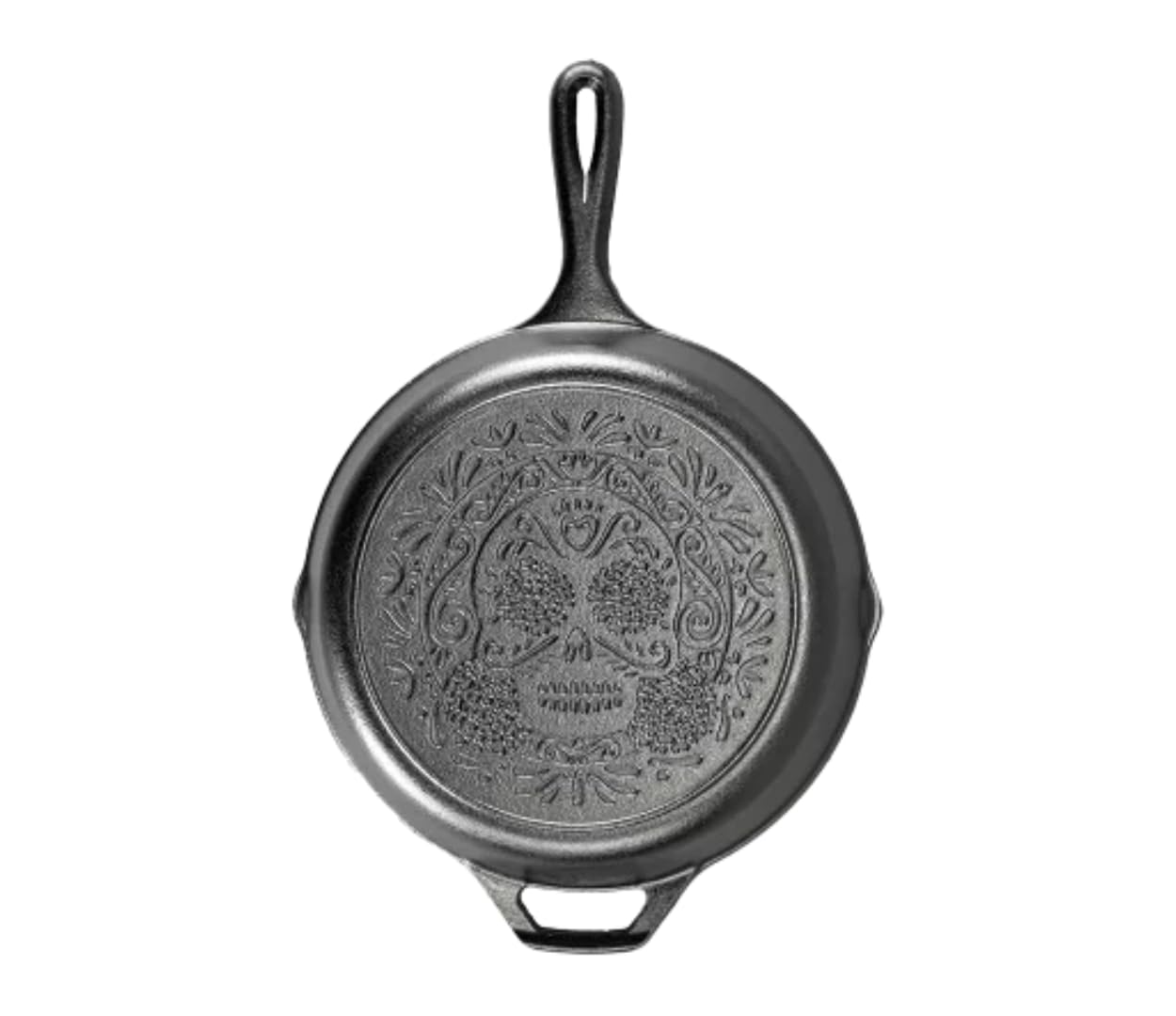 Lodge skillet front view showing sugar skull artwork and cooking-ready finish