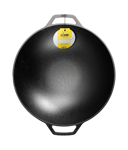 Lodge wok front view showing bowl shape and flat base for even heat