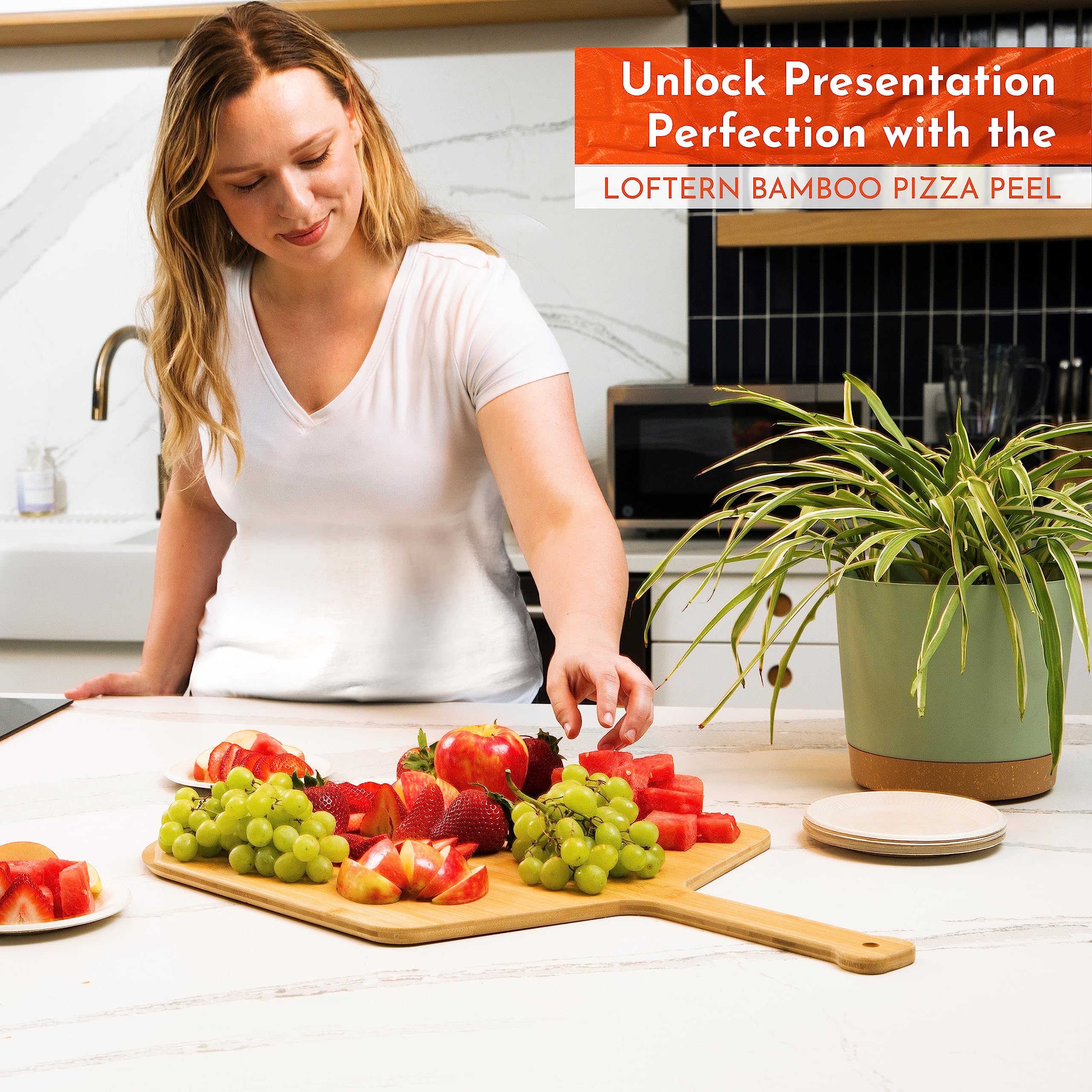 Loftern peel next to a 16-inch pizza to show scale and fit for accurate sizing