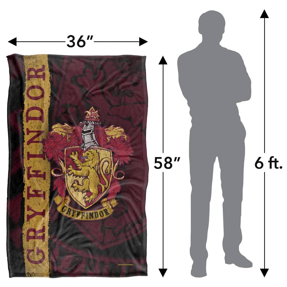 LOGOVISION blanket draped on couch showing fandom decor and cozy lounging