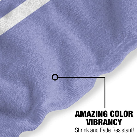 LOGOVISION towel next to lounge chair showing 30x60 inch size scale