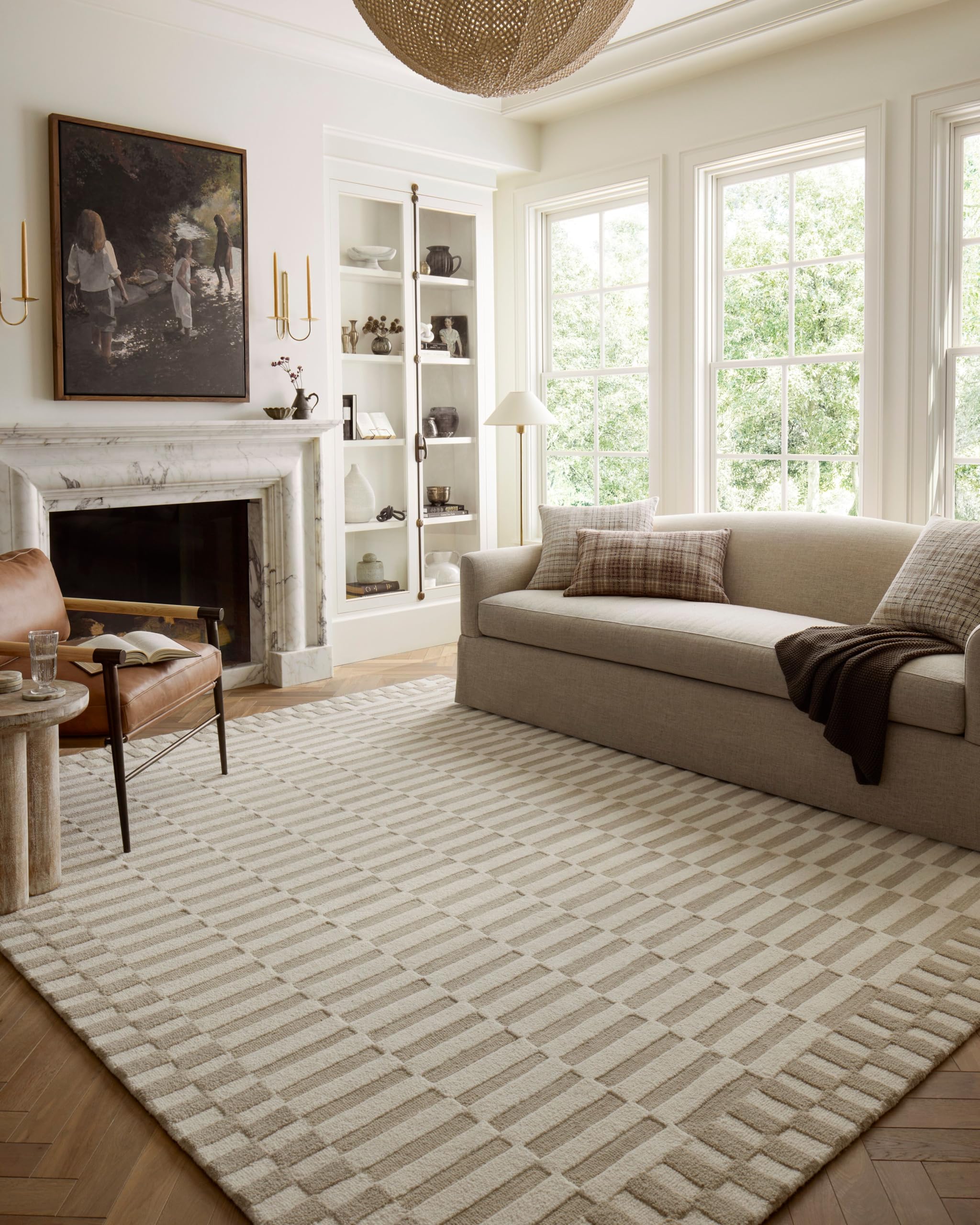 Loloi Bradley front view showing full ivory beige striped rug benefit anchors room