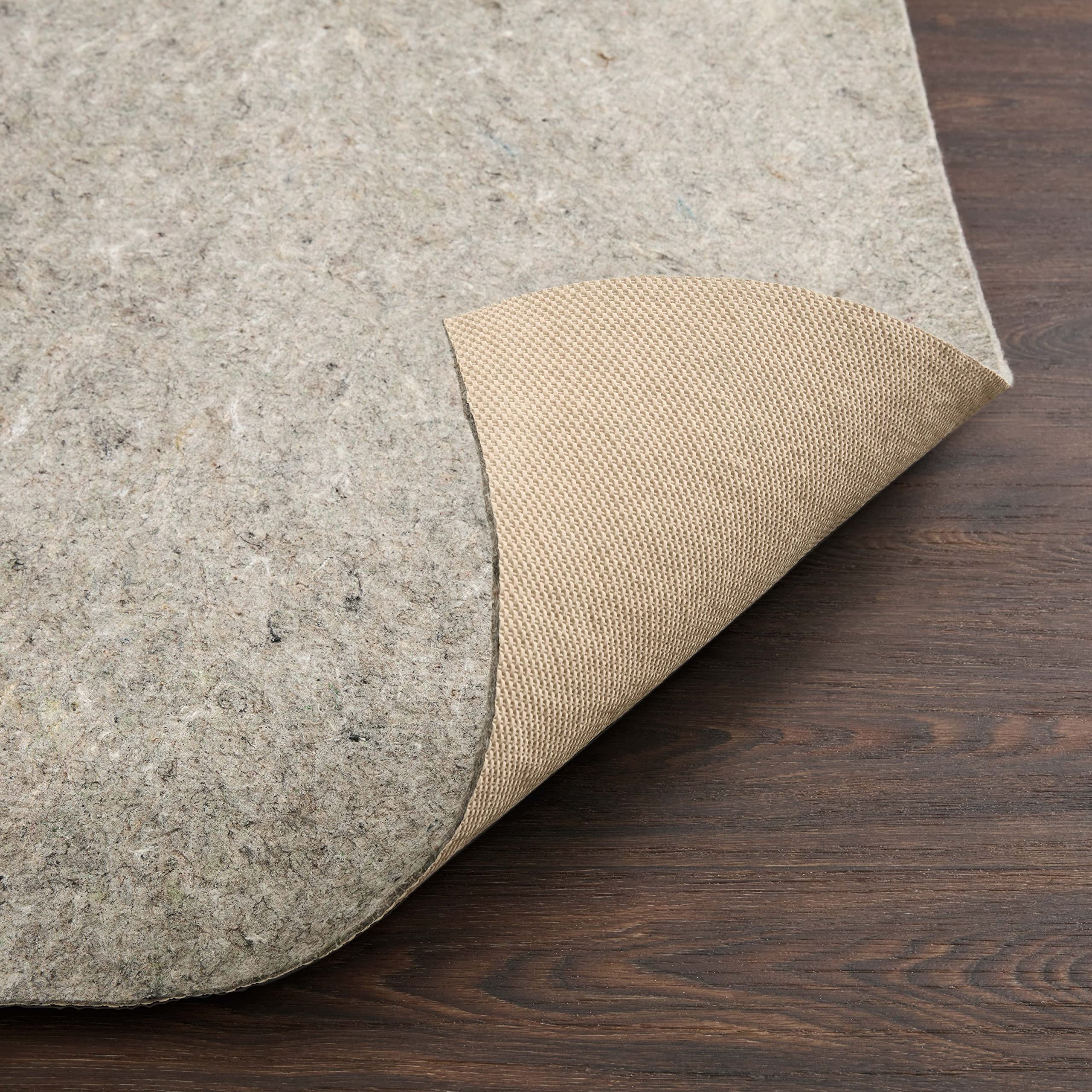 loloi rug pad in living room showing added comfort and floor protection benefit