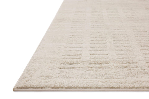 Loloi Monty edge and label detail showing construction and OEKO-TEX certification benefit