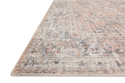 Loloi Skye corner detail highlighting distressed motif and stitched edge