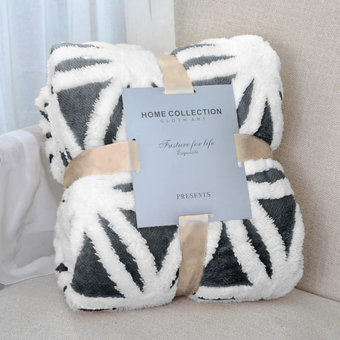 LOMAO blanket front view showing dark grey reversible design and neat edges for stylish warmth