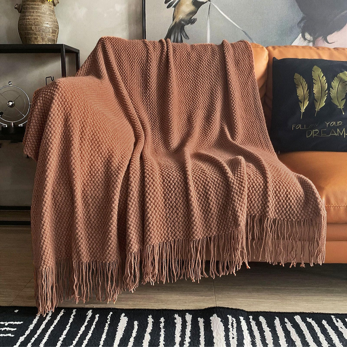 LOMAO front view throw on couch showing color and fit, enhances room warmth