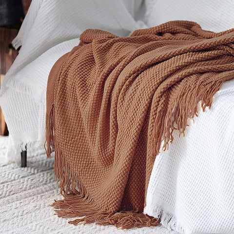 LOMAO folded blanket beside ruler showing 50x60 size for scale