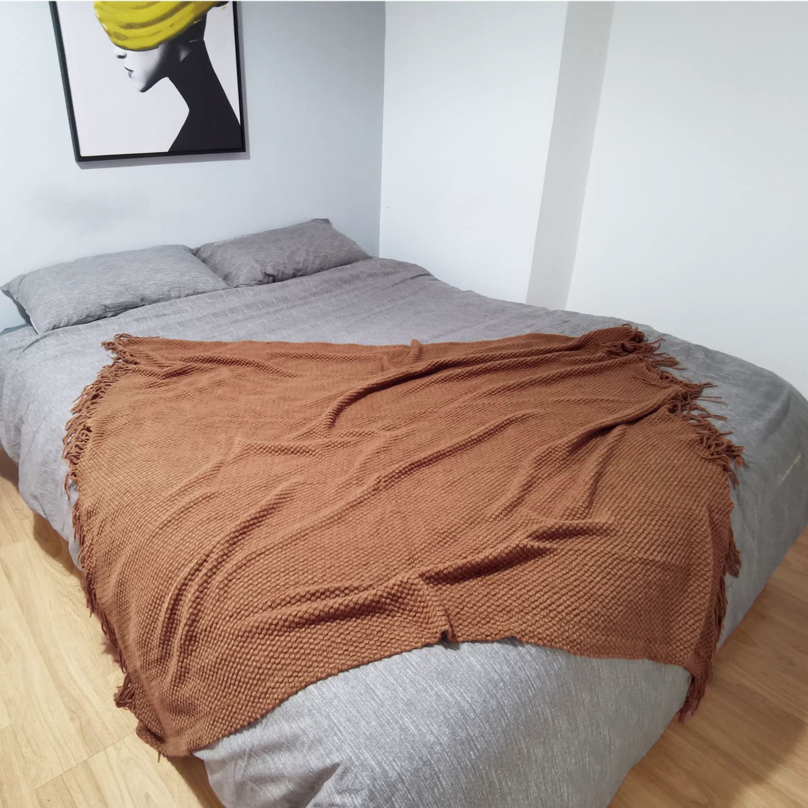 LOMAO rolled throw inside travel bag demonstrating portability benefit