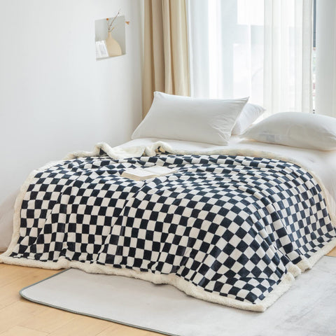 LOMAO throw beside ruler showing 51x63 size for scale and fit
