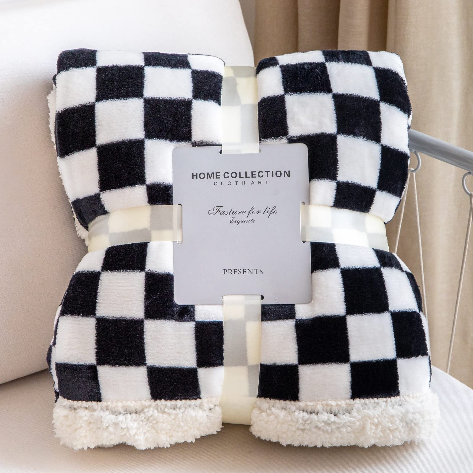 LOMAO throw styled on bed in lifestyle shot suggesting room upgrade