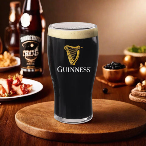 LORD'S ROCKS Guinness glass in use pouring stout to show creamy head formation and presentation