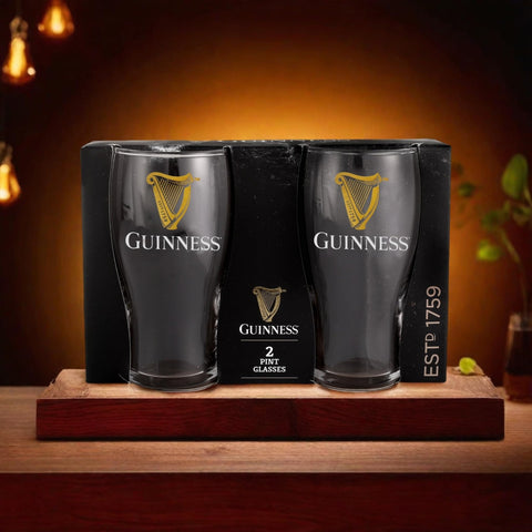 LORD'S ROCKS Guinness glass beside a bottle showing 20oz scale and serving capacity