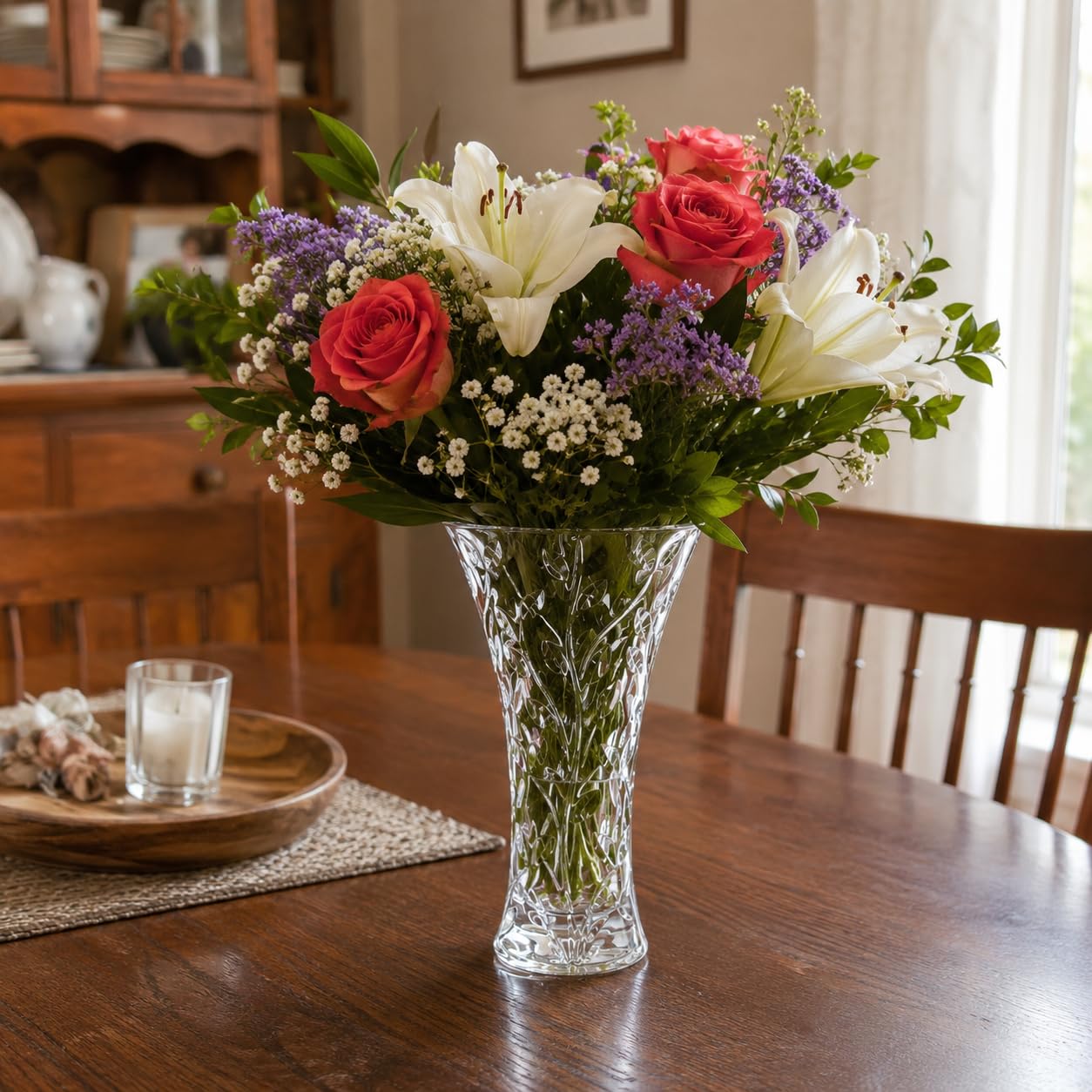 Lorren Home Trends vase held by hand showing scale and sturdy weight