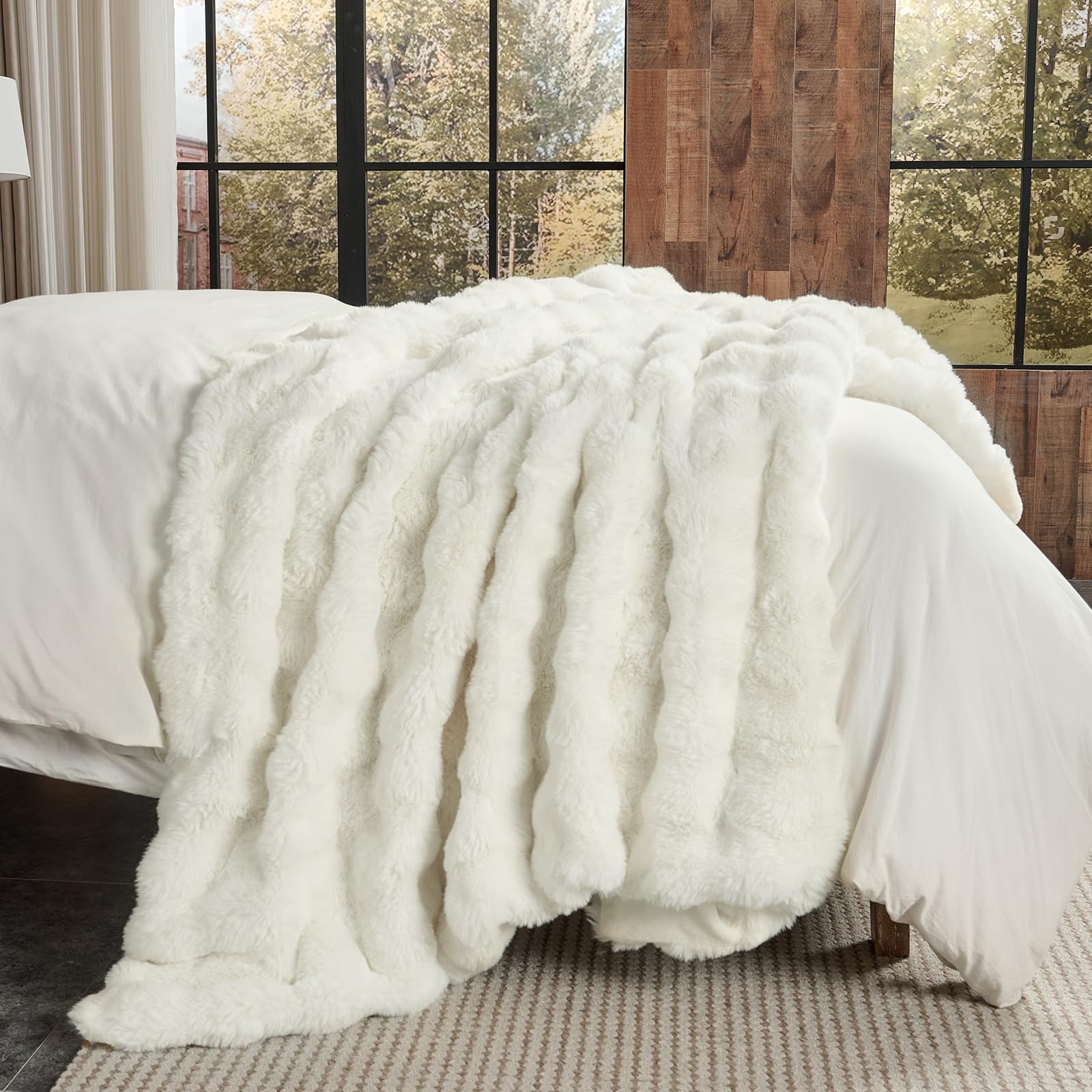 Lotus Karen draped over sofa adding decorative texture and living room warmth