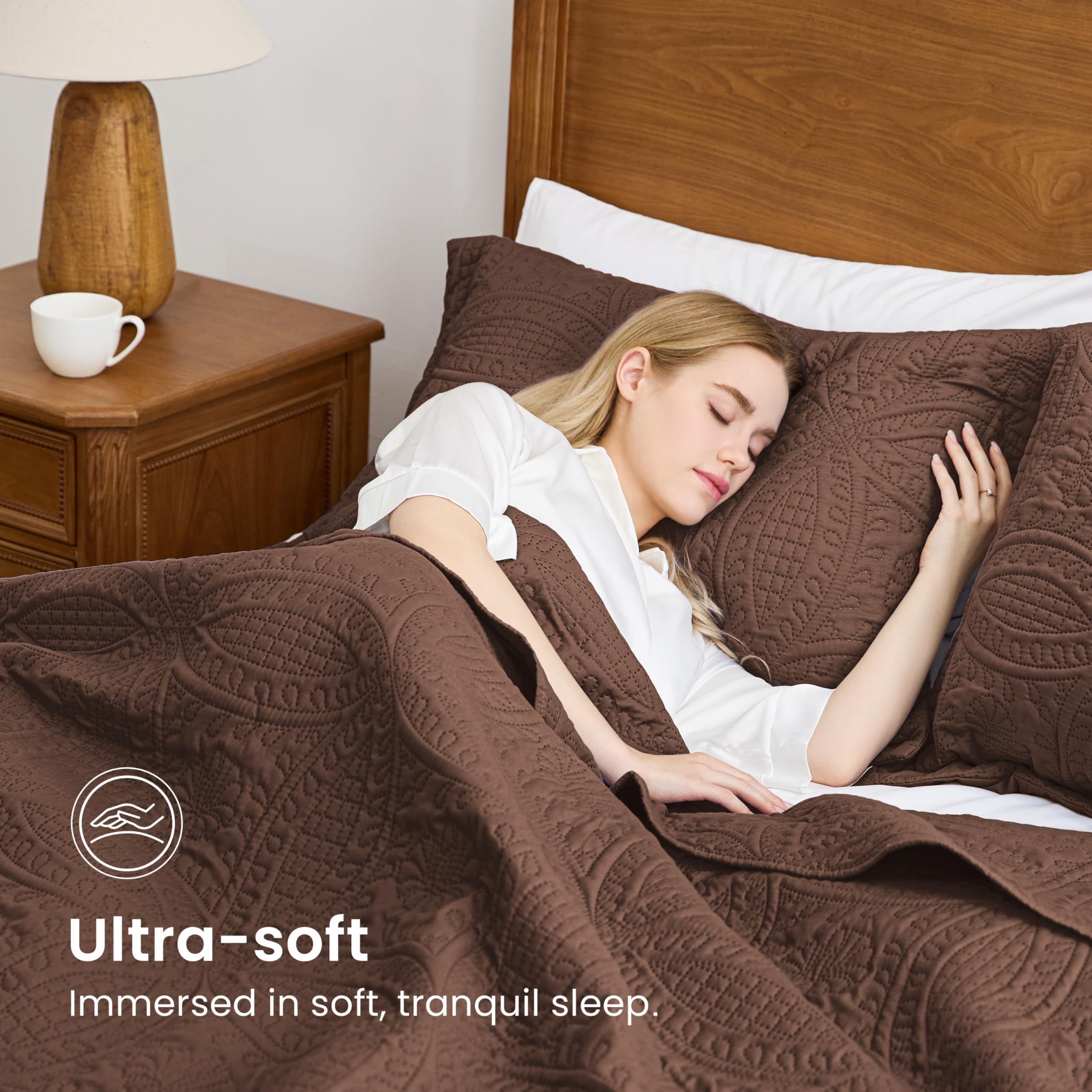 Love's cabin quilt on a styled bed conveys comfort and easy coordination