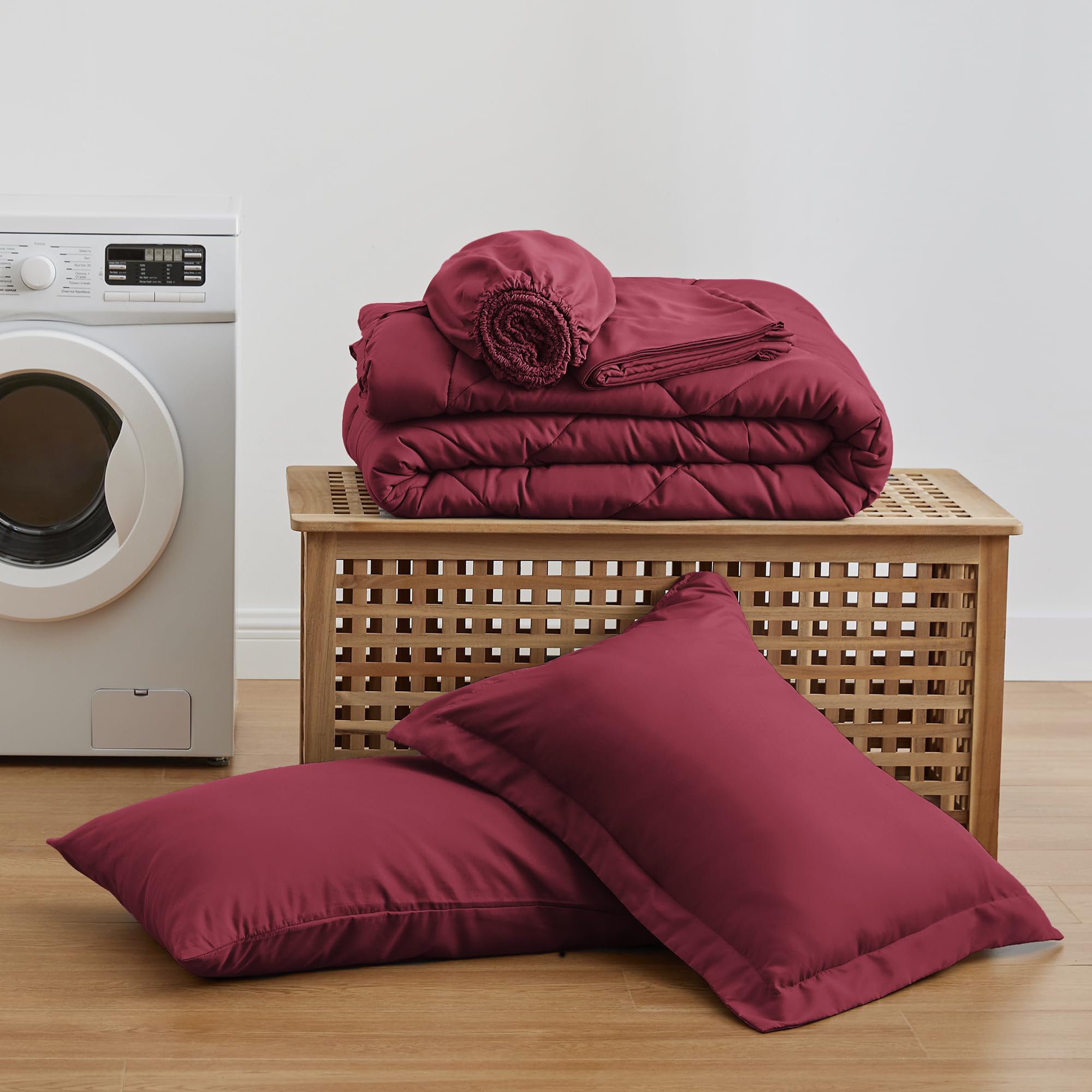 Love's cabin styled bedroom with burgundy set showing cozy, coordinated decor