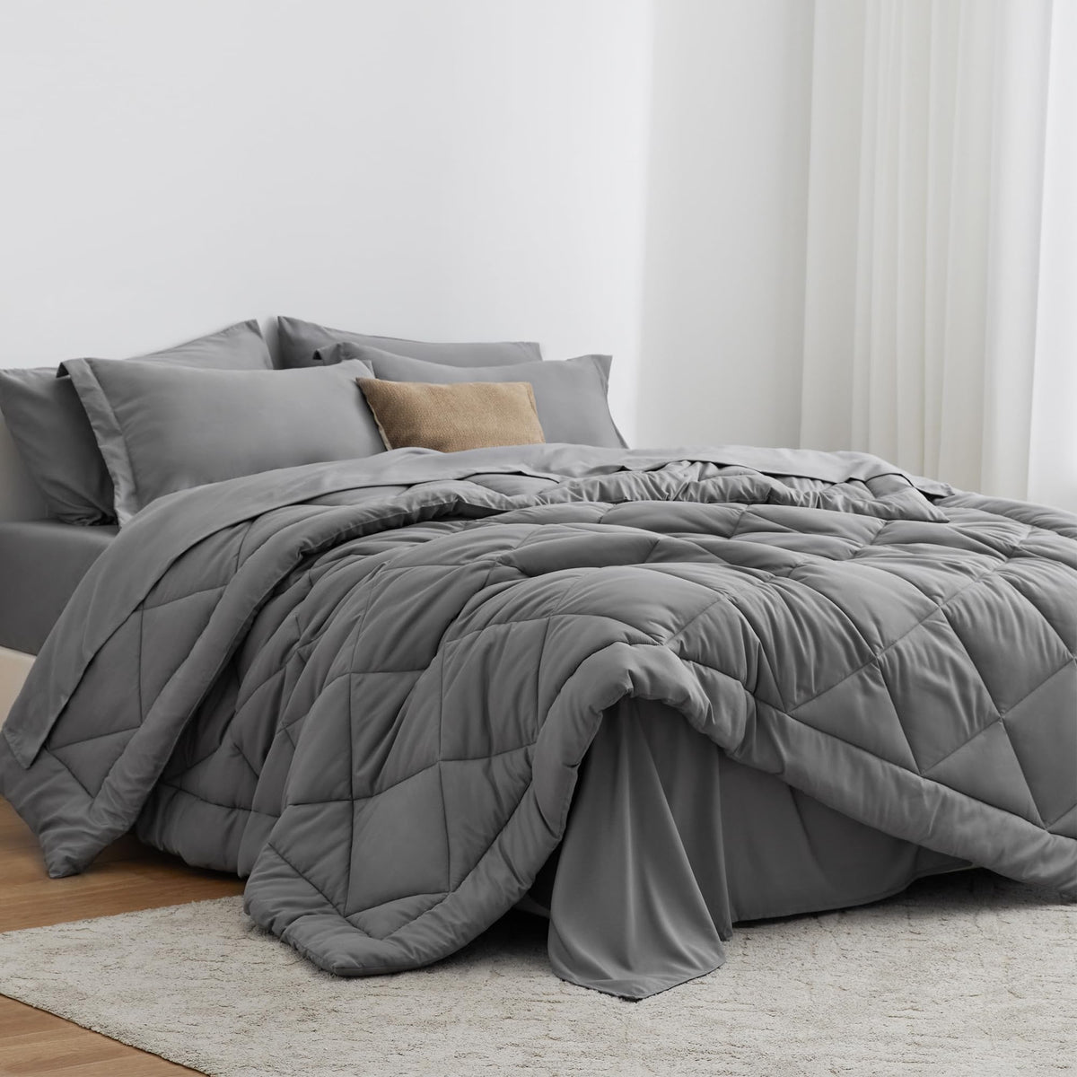 Love's cabin comforter front view in grey showing tidy finish and cozy look