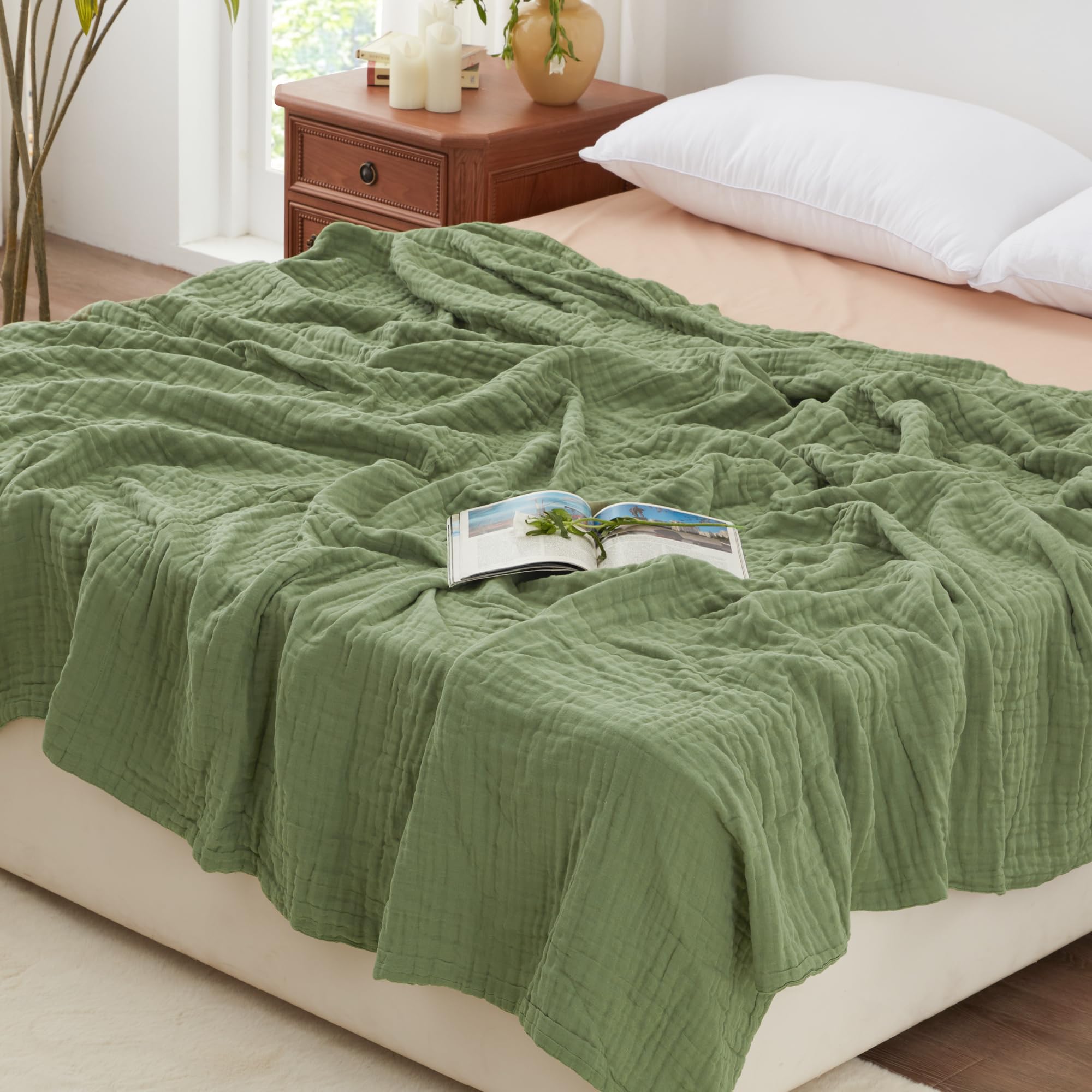 Love's cabin folded sage blanket front view showing soft texture and cozy appeal