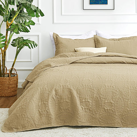 Love's cabin king quilt front view shows clean camel finish and neat coverage