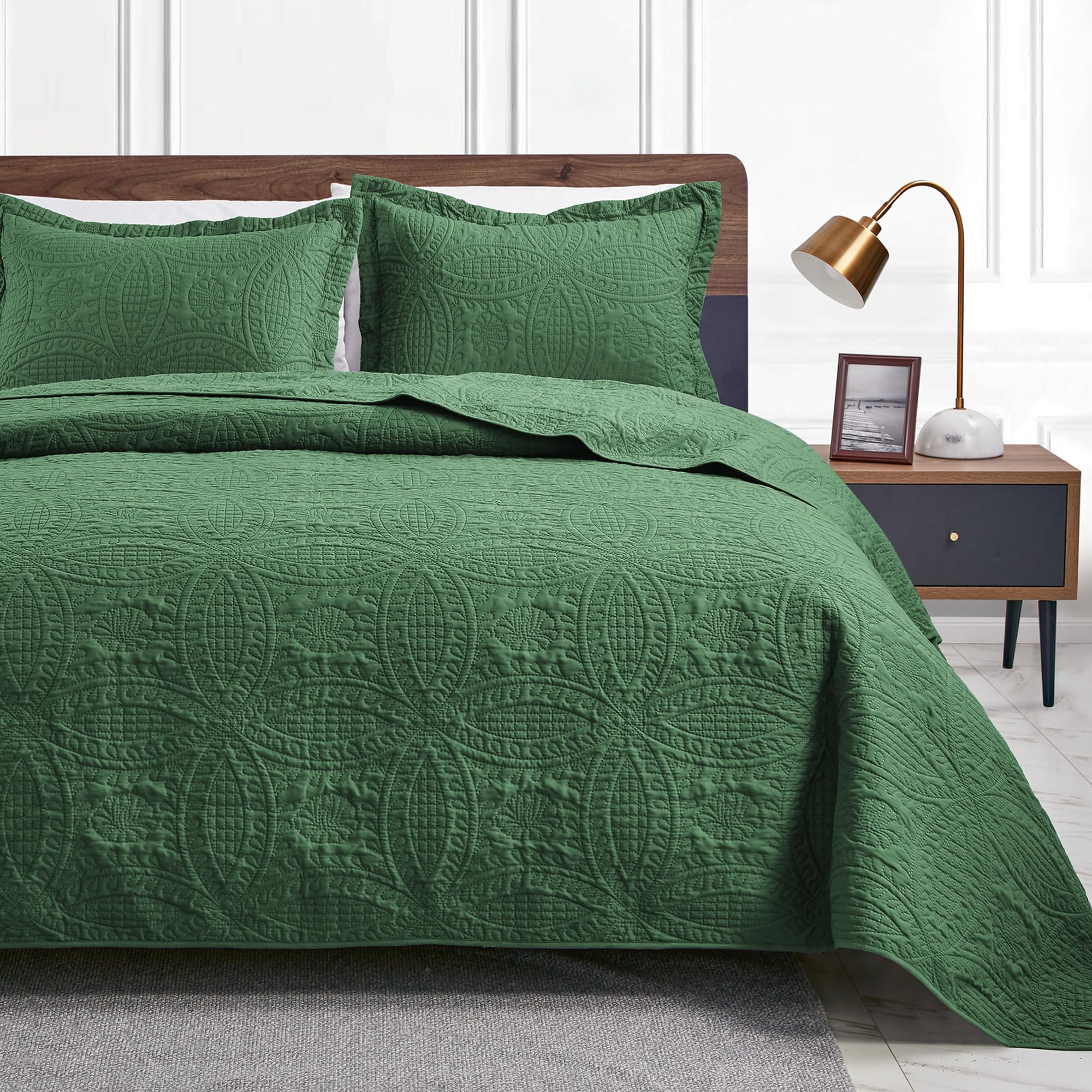 Love's cabin front view of dark green queen bedspread showing modern look and easy styling