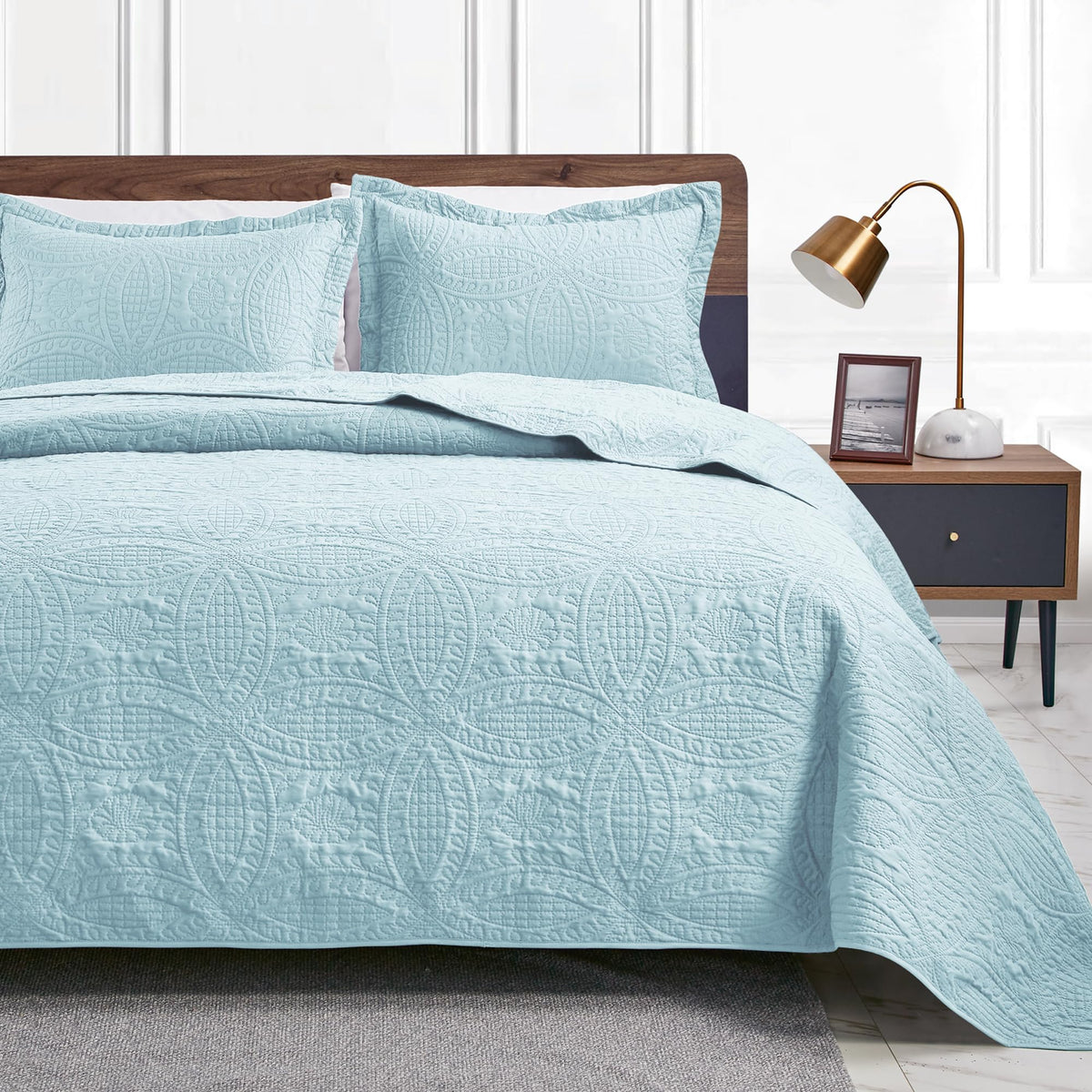 Love's cabin queen quilt front view showing spa-blue color and modern look