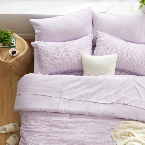 Love's cabin folded comforter demonstrating loft and lightweight warmth