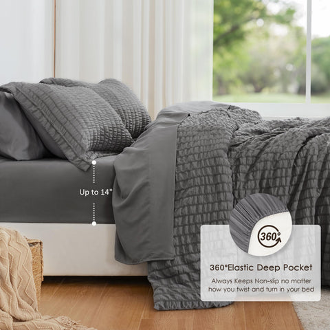Love's cabin comforter on queen bed showing dark grey elegance and cozy appeal