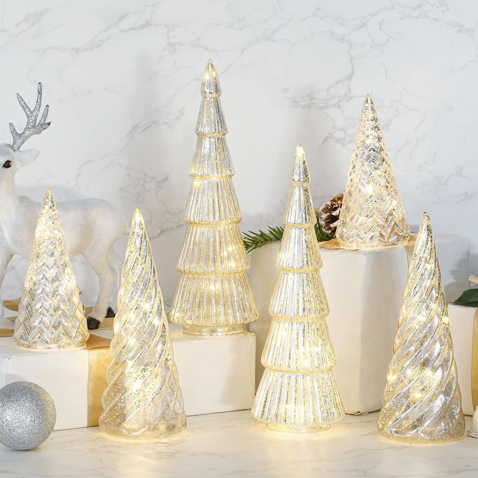 LOYIM illuminated LED fairy lights inside glass tree creating warm ambient glow
