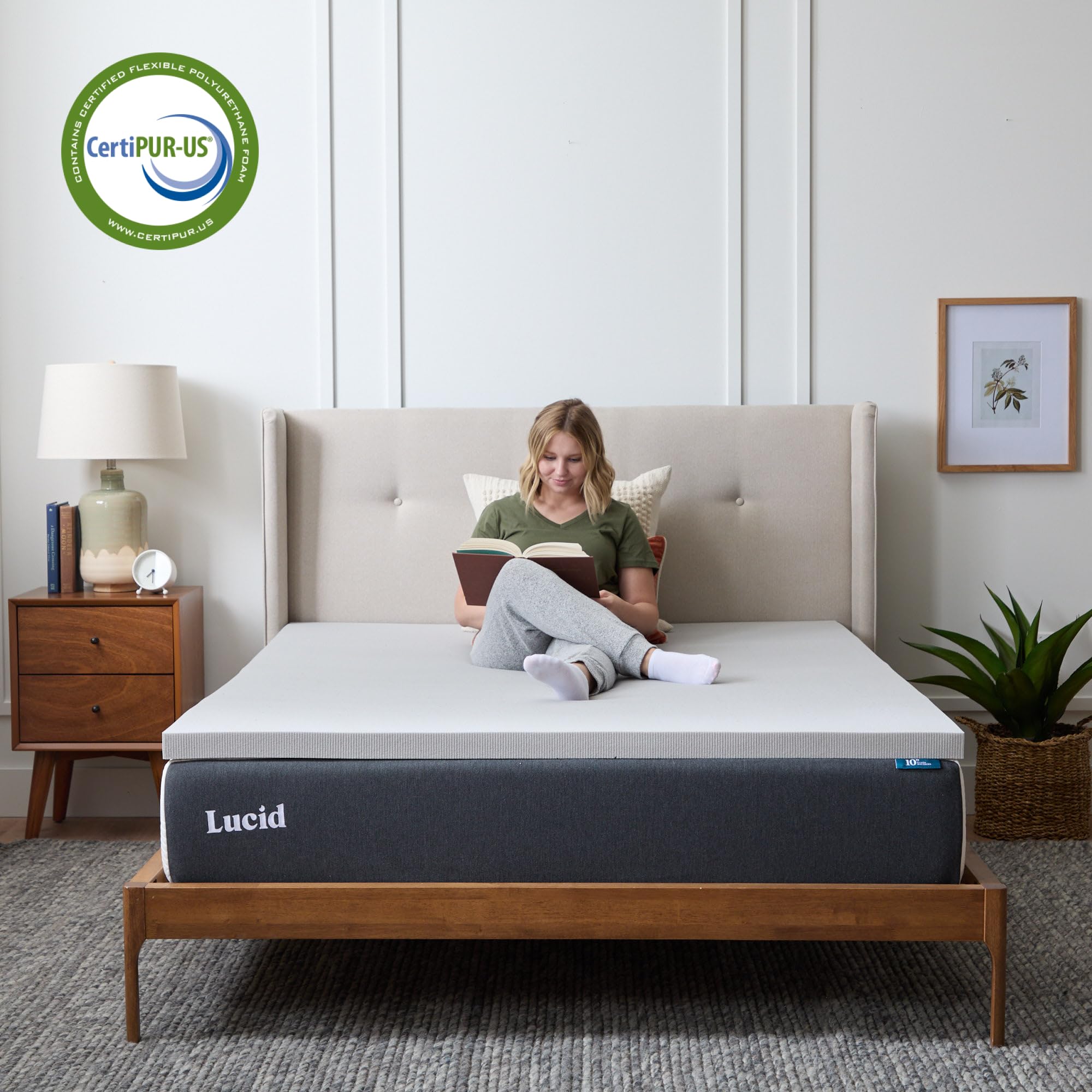 Lucid topper on a made bed illustrating enhanced comfort and softer sleep surface