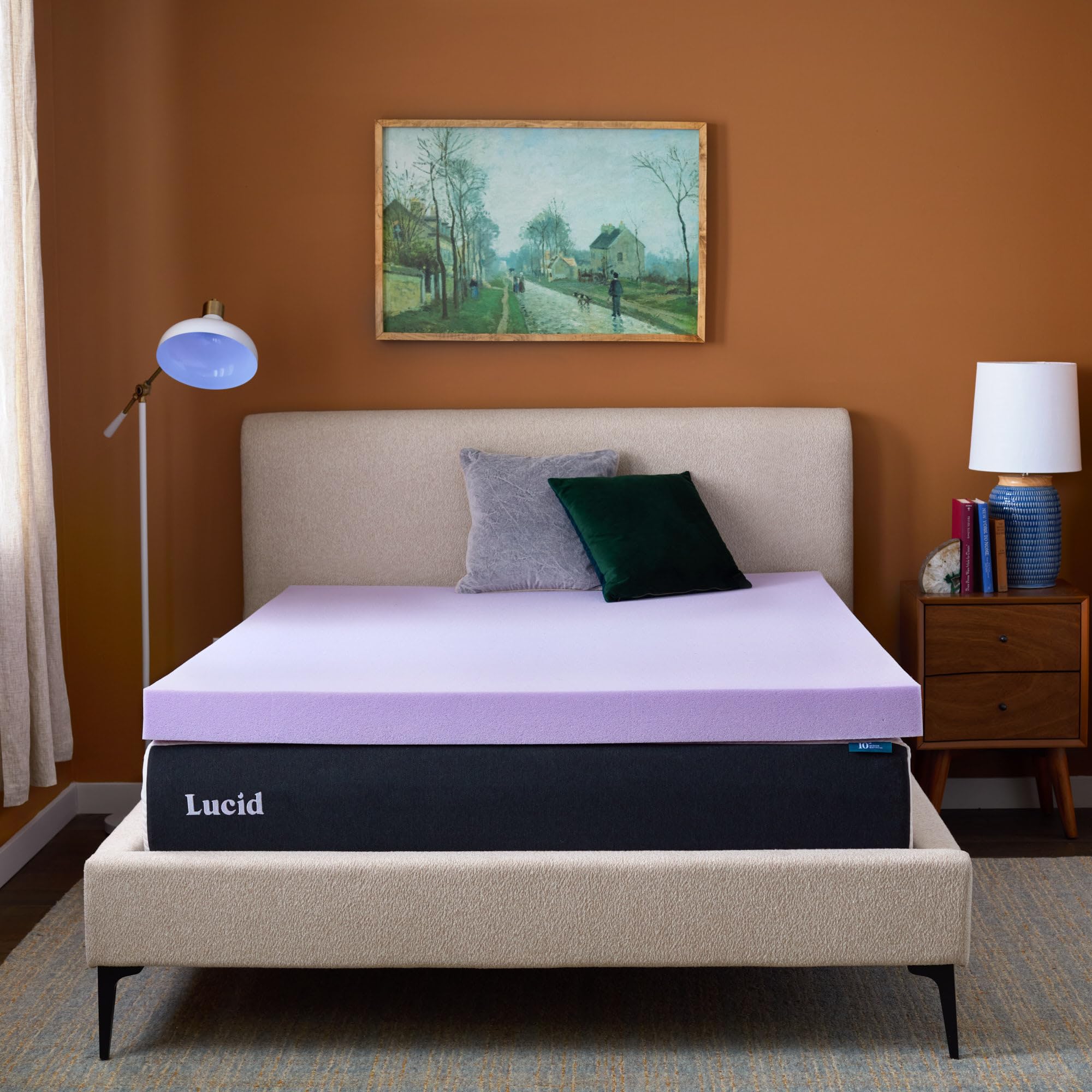 Lucid unpacking topper from box demonstrating simple unroll setup benefit
