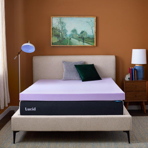 Lucid unpacking topper from box demonstrating simple unroll setup benefit