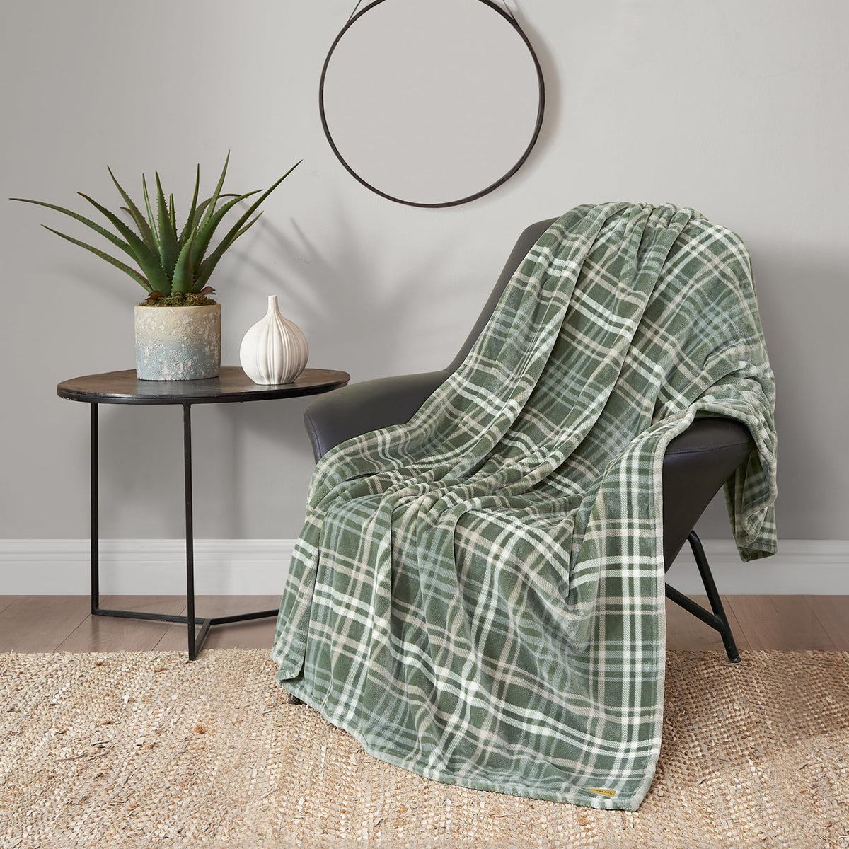 Lucky Brand folded throw showing olive plaid and neat edges for stylish storage