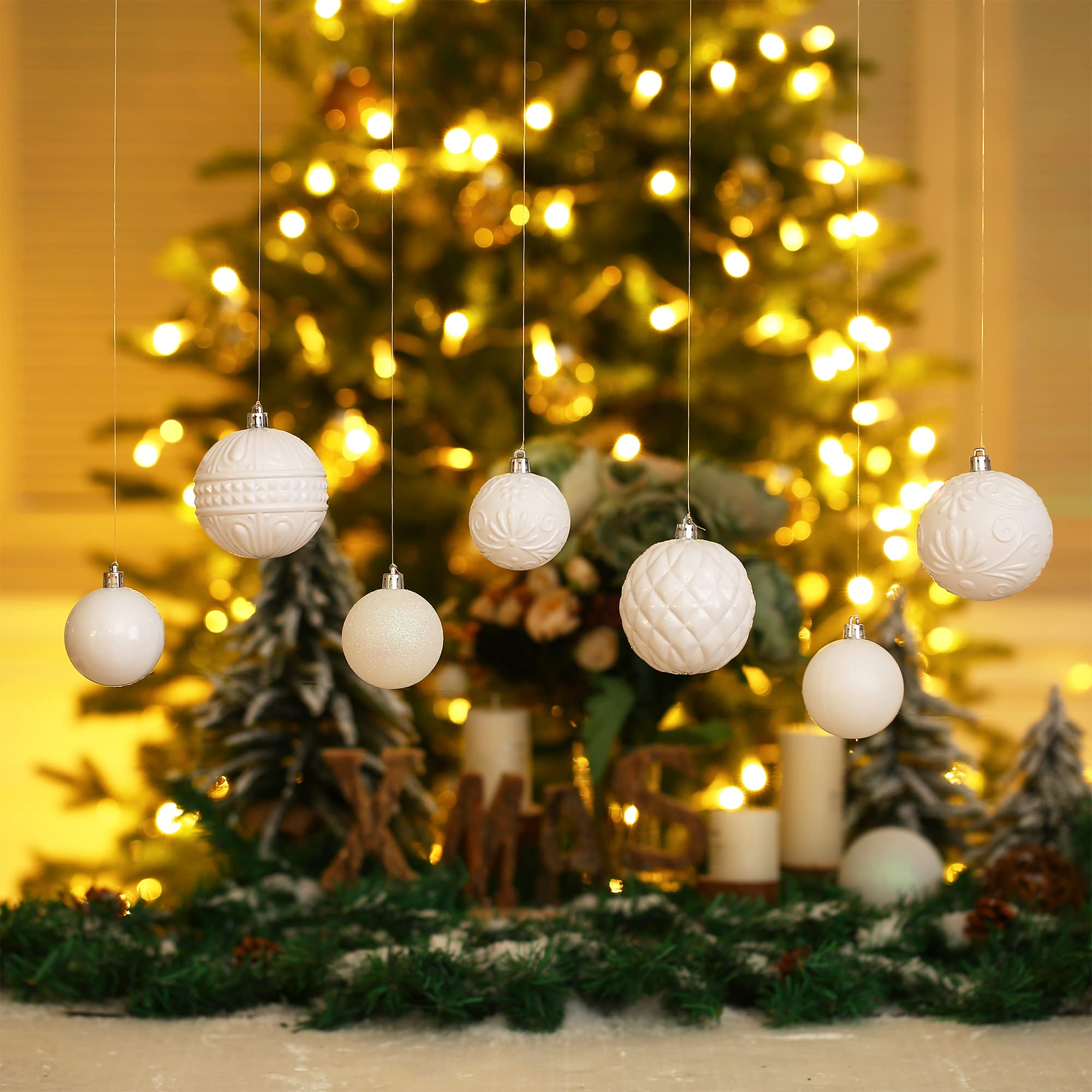 LUCKYCHRIS ornaments hanging on tree illustrating cohesive white holiday look