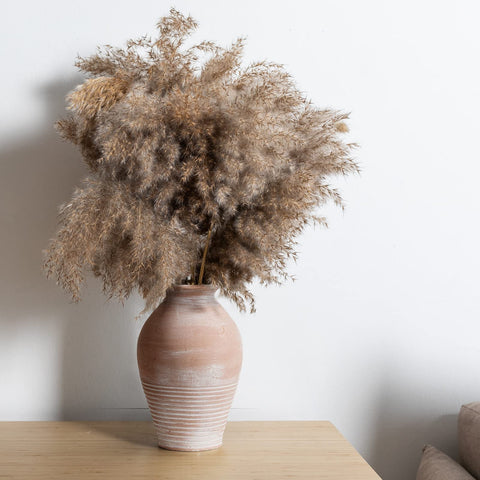 LUKA vase styled on shelf in living room adding warmth and layered décor benefit
