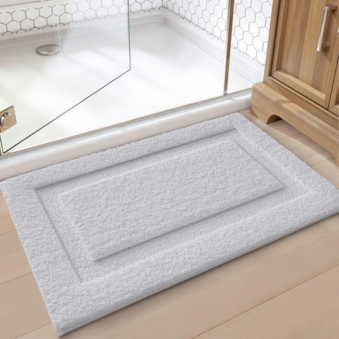 LUMI size comparison with towel showing 24x36 scale and fit