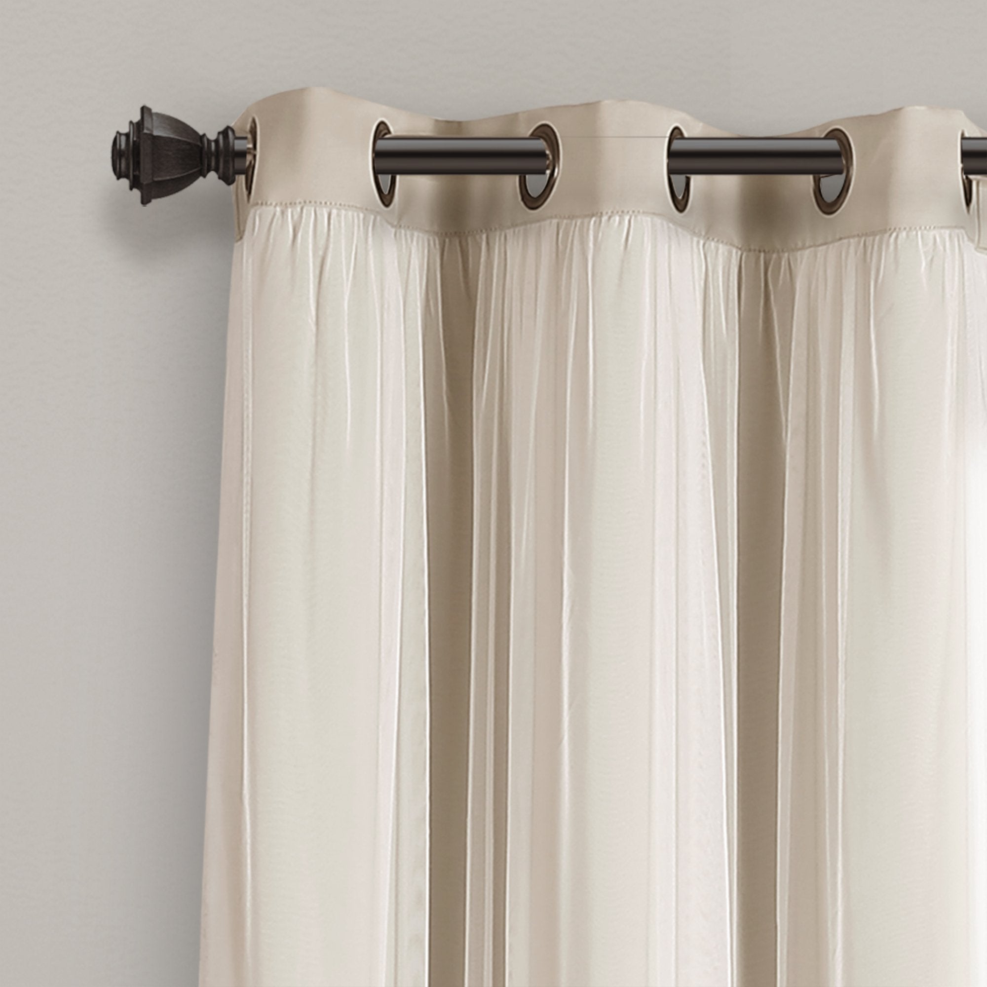 Lush Decor curtains hung on rod in bedroom showing improved darkness and cozy feel
