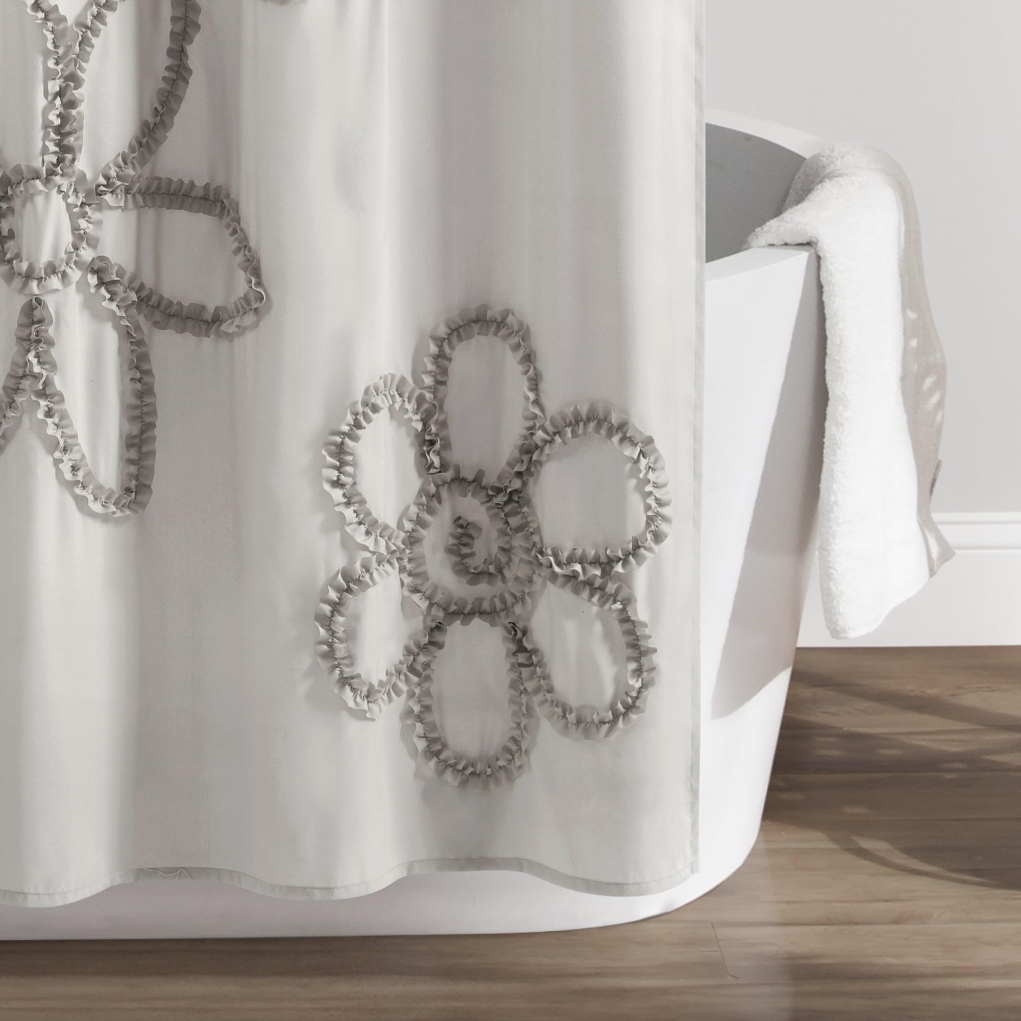 Lush Decor in a styled bathroom showcasing how the curtain brightens the space